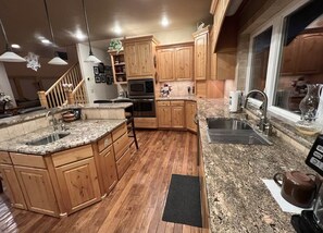 Kitchen window is a "pass-thru" window for easy front deck dining.