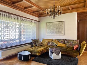 Furniture, Interior Design, Flooring, Couch, Floor, Wood, Ceiling, Living Room, Home, Textile