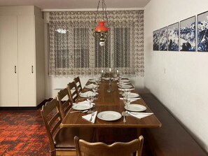 Furniture, Interior Design, Wall, Table, Flooring, Wood, Ceiling, Floor, Light Fixture, Dining Room