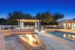 Take in the cool, desert nights next to the firepit and hot tub. Play ping pong under the gazebo while you grill up some steaks!