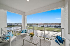 Balcony with LAKE view. Clubhouse is across the lake!#Disney #Parks #kingdom #springs #StoreyLake #Apartment #Vacation #Rental #waterpark #Kissimmee #Orlando #universal #citywalk