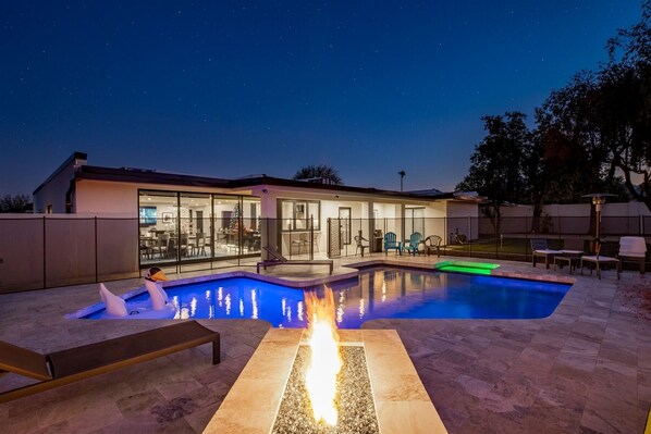 Private Backyard with Fire Pit, Heated Pool, Spa & Putting Green