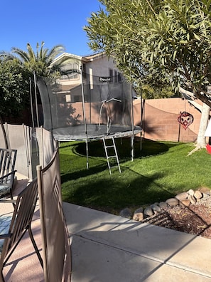 Trampoline and grass area