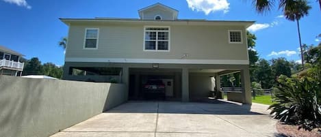 Covered parking and large driveway.