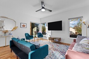 Living Room with Large windows & Plenty of light |Sofas can be converted to beds