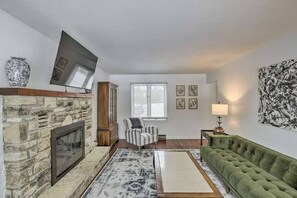 Living Room with Wood Burning Fireplace (1)