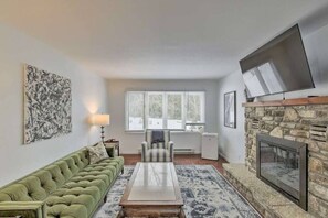 Living Room with Wood Burning Fireplace