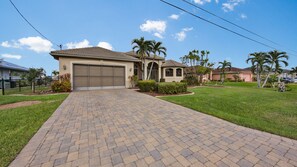 Front of house and tile driveway