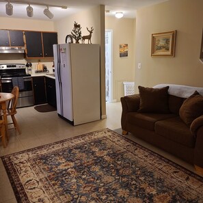 Enjoy a fully loaded kitchen with cookware and dishes 