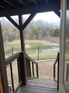View from Master Bedroom out private door to lake 