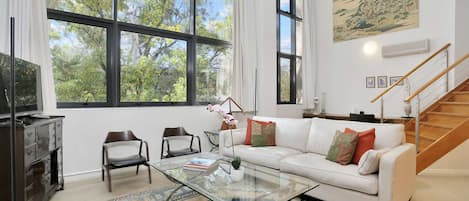High ceilings and loads of natural light with leafy views