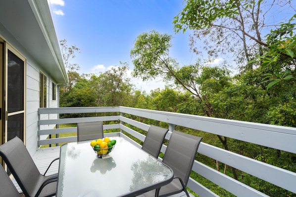 Enjoy your morning coffee in this spacious balcony with the garden view