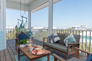 Fully Enclosed 3rd Floor Patio with Seating and Hammock Chairs (1)