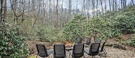 Experience a fire pit overlooking the majestic views of the Smoky Mountains