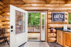Entryway: Step inside this rustic haven, where nature meets charm at Streams of Heaven!