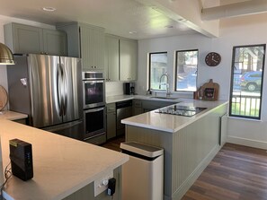 Open plan kitchen/dining/living room.  