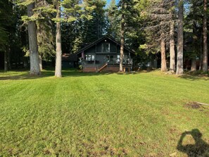 Walk from the cabin to the dock at the lake...