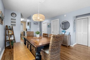 This inviting dining space has plenty of room for everyone to gather — whether you're sharing a meal, playing a game, or swapping stories about the day's adventures.