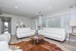 Living Room Area w/ 65in Smart TV