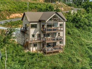 3 levels of covered decks with mountain views