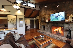 Living room with a wood burning fireplace