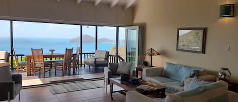 Great Room Living Area - onto Covered Deck with dining and Sea View