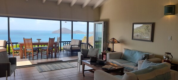 Great Room Living Area - onto Covered Deck with dining and Sea View