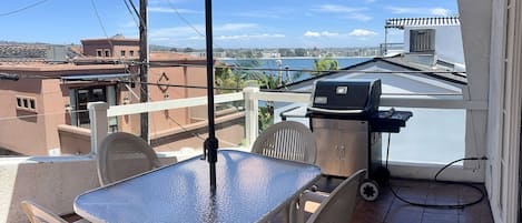 View of bay from deck on 3rd floor.  Gas BBQ