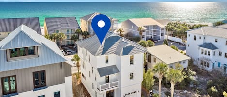 Steps from the beach at "Seaside Sister"; the ocean views, white sands and the community pool are awaiting your arrival!