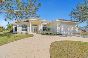 This classic Florida pool home on a freshwater canal is centrally located in Cape Coral, allowing you to easily enjoy the best of SWFL.