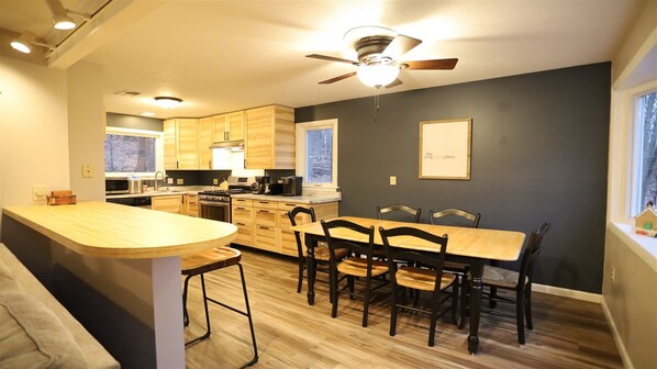 Dining Table and Serving Bar in Private Waterville Estates Home
