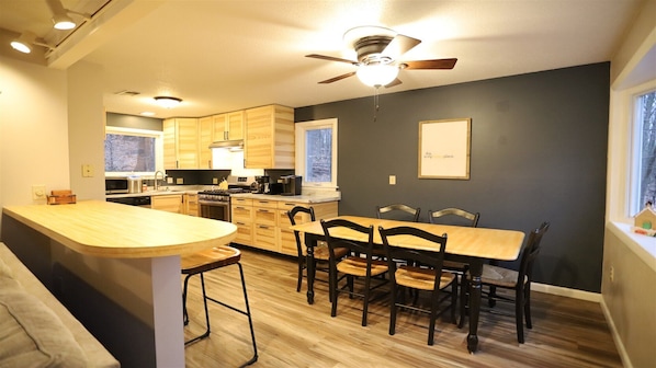 Dining Table and Serving Bar in Private Waterville Estates Home