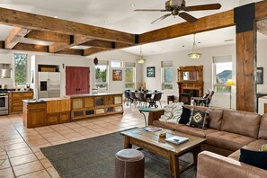 Spacious open living area with high ceilings