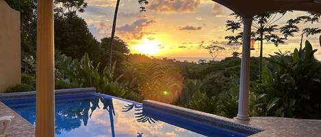 Beautiful sunset views from the private swimming pool patio. 