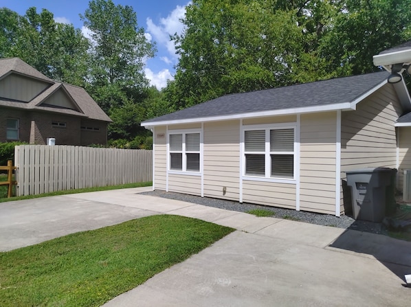 Nice paved drive, ADA compliant accessibility and pet friendly with fenced yard.