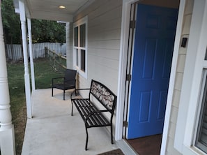 Well-lit covered veranda.