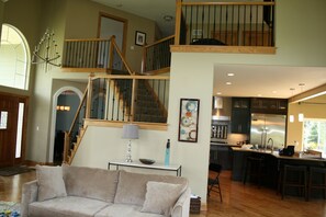 Awesome tall ceilings from the family room up to the loft landing.