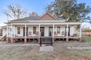 Step into history and experience the charm of our historic home, thoughtfully divided into two distinct yet equally inviting spaces. Welcome to Charming Ivy Street on the left side and Southern Magnolia House on the right. Nestled in a small town within a safe area, this unique accommodation is just blocks away from the breathtaking beauty of Caddo Lake.