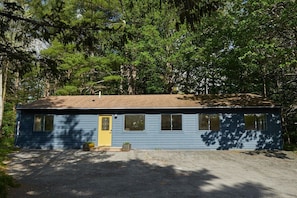 Tucked into a peaceful forested setting with ample parking space.
