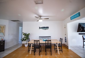 Dining area, with ample seating for many guests.