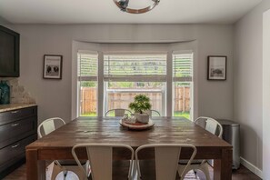 Sit at the dining table and enjoy a meal!