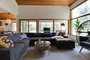 The open floor plan connects to the dining area and kitchen