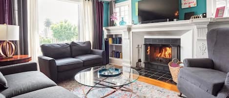 Cozy gas fireplace and lots of space for hanging with family and friends.