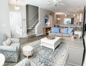 Walk straight into the spacious main living area on the ground level