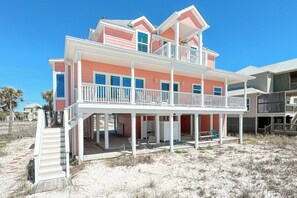 Beach side exterior of By the C
