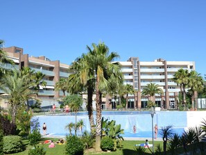 Plant, Sky, Water, Property, Building, Azure, Tree, Swimming Pool, Urban Design, Arecales