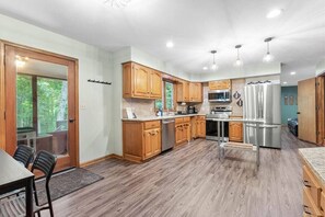 Newly renovated kitchen is perfect for family meal prep and hanging out