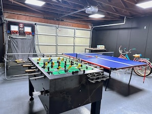 Amazing Game Room with Ping Pong Table and Foosball Table