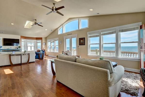 Stunning ocean views with multiple private decks and living/gathering room and bedroom. Top level 