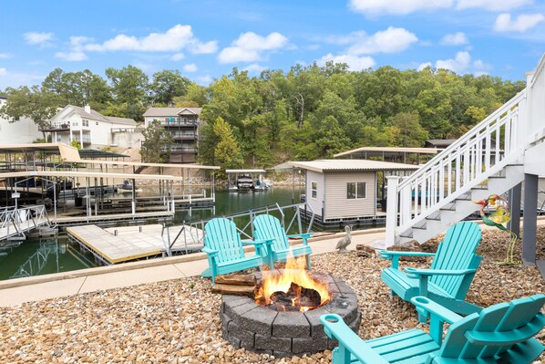 Welcome to Serentity - the perfect spot for an evening fire watching the sunset over the lake!